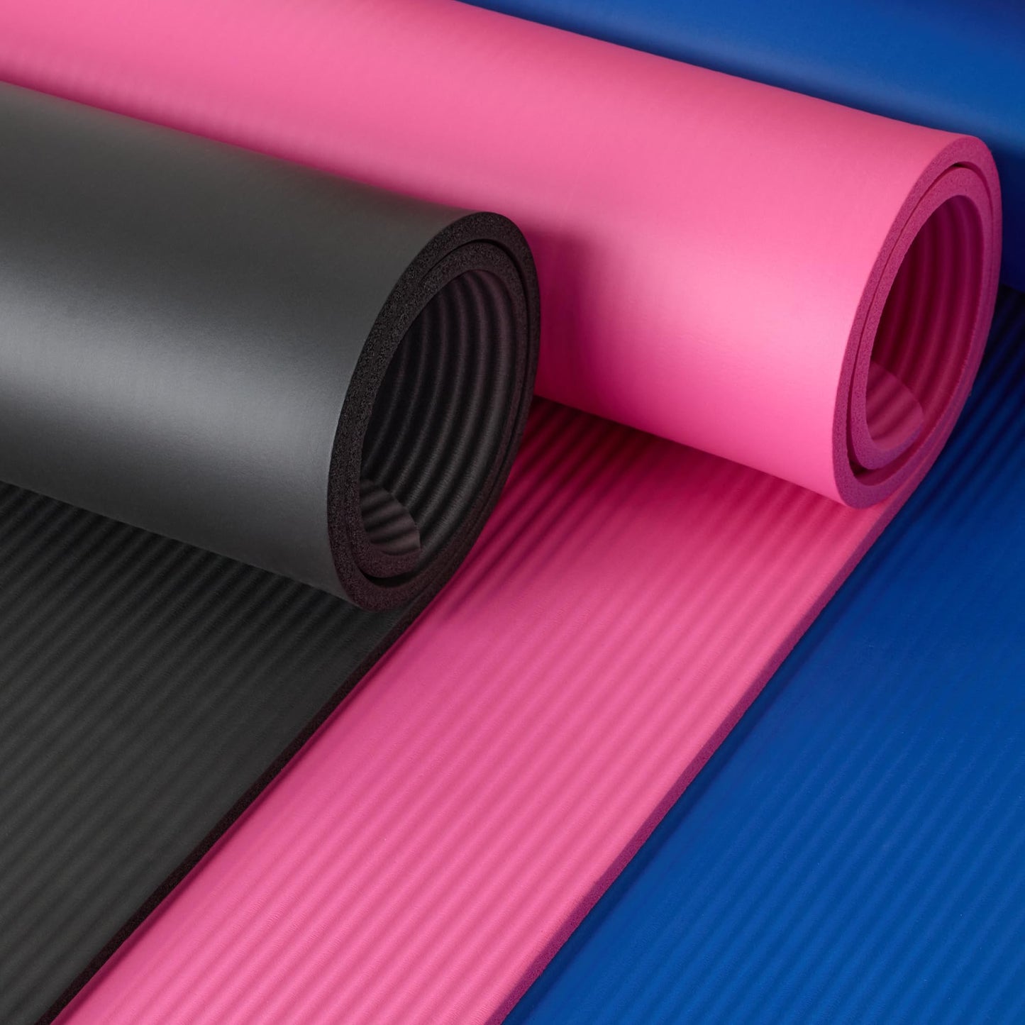 Amazon Basics - Alfombrilla de yoga y ejercicios con cinta de transporte, extragruesa, grosor de 1,2 cm, negro