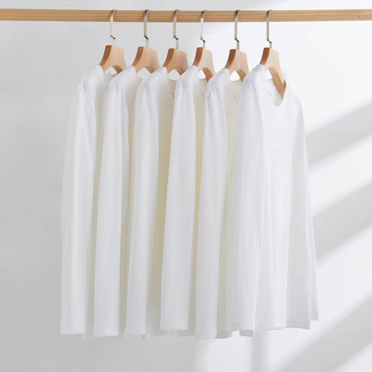 OEM Customized 230g cotton long sleeved white tshirt for men heavyweight loose solid color cotton bottoming tshirt for men