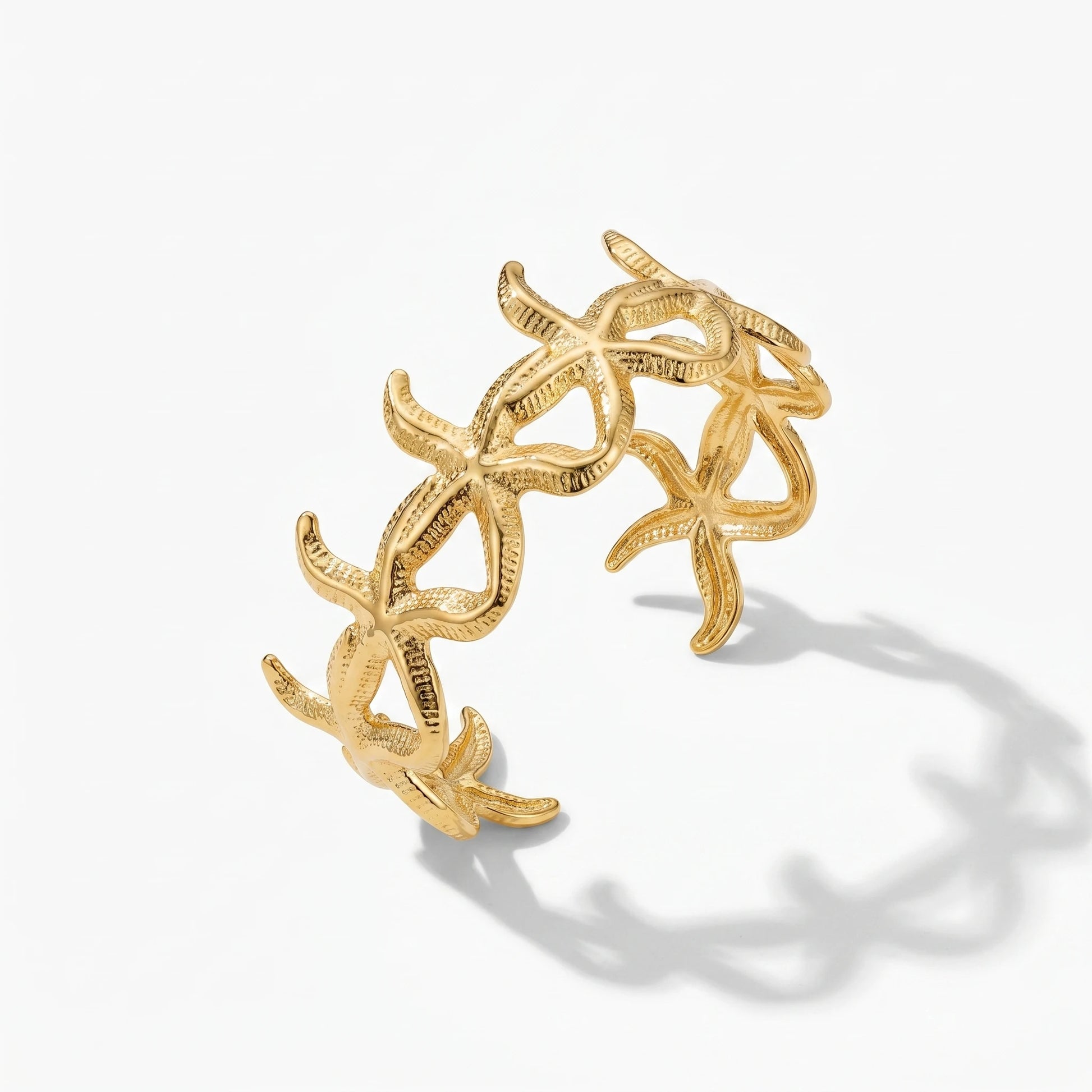 QIAOREN 12713 18K Gold Textured Linked Starfish Hollow Open Cuff Bracelet Stainless Steel Adjustable Stackable Ocean Wrist