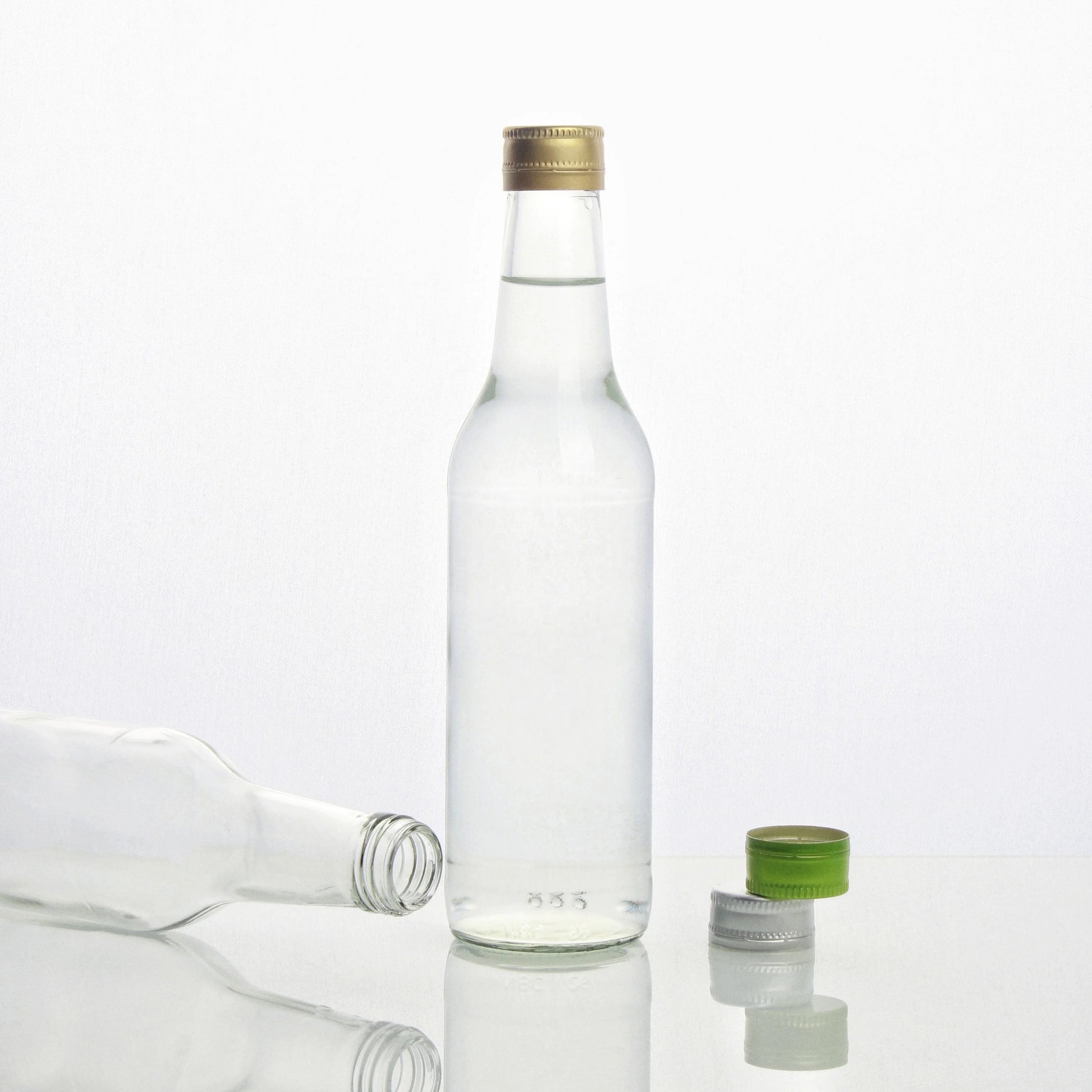 In Stock Wholesale 330ml Cork Sealed Mineral Water Glass Bottles for Brandy Tequila Energy Drinks