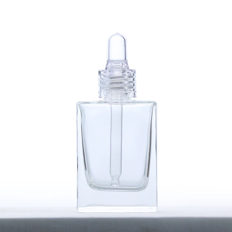 Luxury 1 oz Custom Empty Glass Dropper Bottle 20ml 30ml 50ml Thick Cosmetic Face Serum Packaging Screen Printing Surface