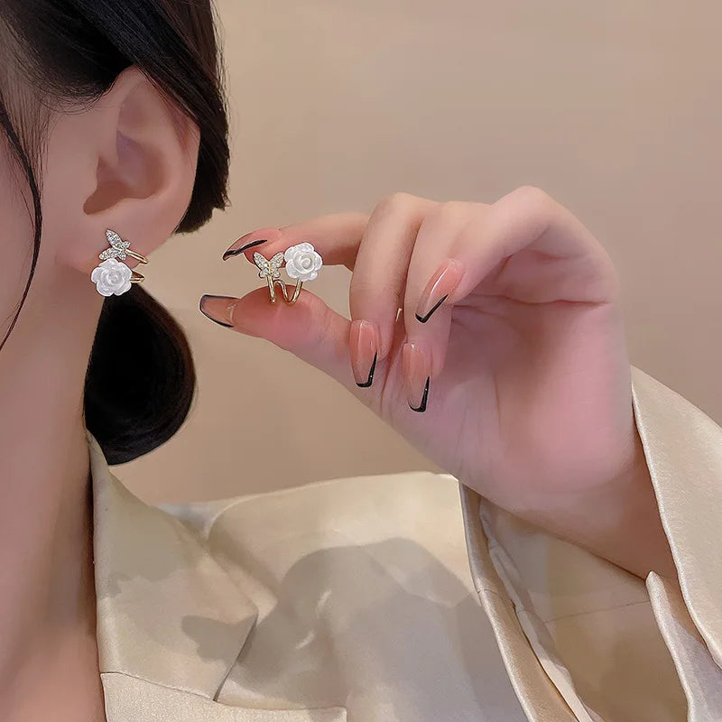 Light Luxury Elegant White Flower Personalized Zircon Earrings for Women Ear Claw S925 Silver Needle Micro-set Butterfly Earr