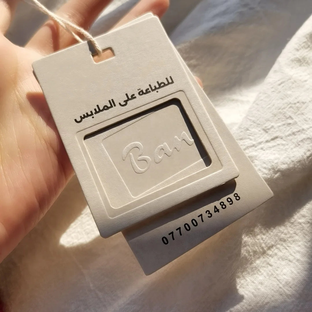 Recycled Custom Beige Paper Hand Tags Embossed Swing Label Garment Hangtags for Clothing Shoes and Bags