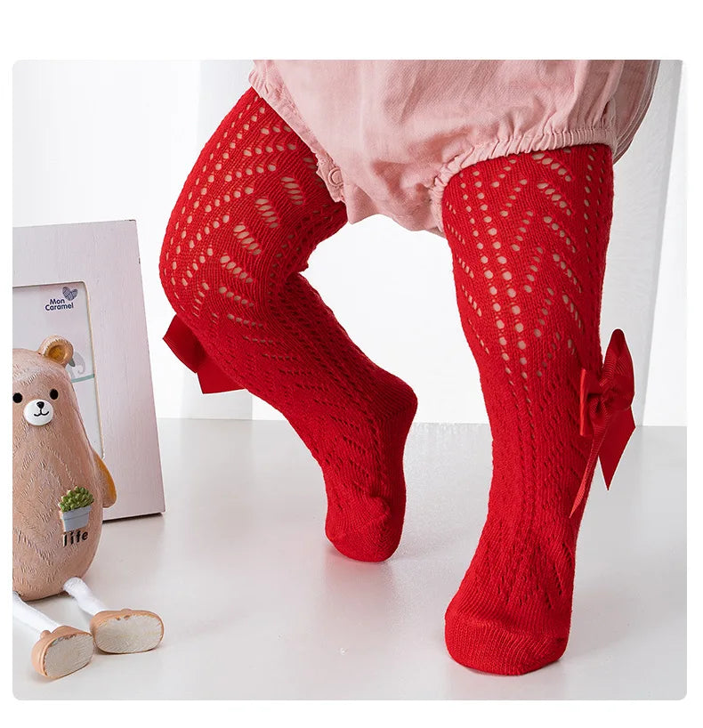 China Cheap Solid Color Breathable Mesh Bow Tie Baby Girls Tights for 0-4 Years SZSO-024