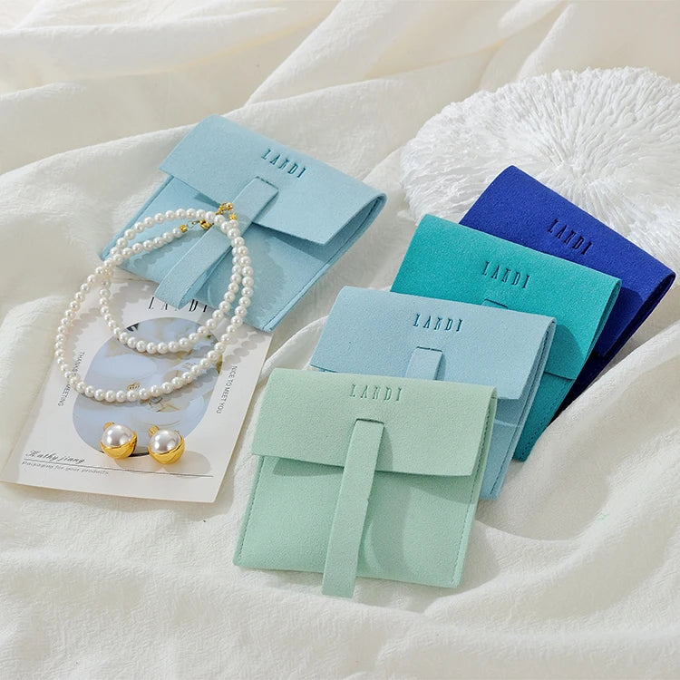 Elegant Luxurious Microfiber Jewelry Container Flap Envelope Pouch with Deboss Logo for Presenting Luxurious Pieces