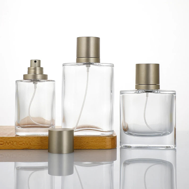Fashion 30ml 50ml 100ml Crimp Cylinder Clear Wooden/Plastic Cap Pump Sprayer Glass Empty Luxury Logo Custom OEM/ODM Bottle