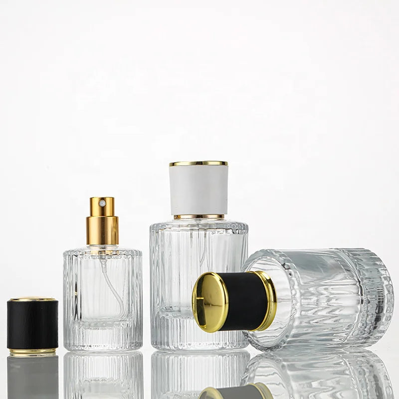 Hot Sale 30ml 50ml Round Cylinder Transparent Spray Glass Perfume Bottle with White Cap Wholesale Empty Women's Perfume Bottl