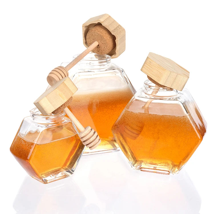 Custom Logo Hexagonal Shape Glass Honey Storage Jar with Wooden Dipper and Bamboo Lid