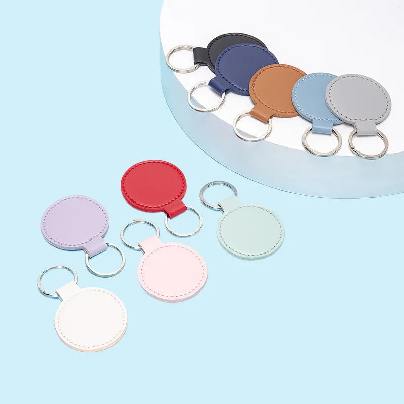 Custom logo PU Leather Key Chains Car Key Holder Strap Blank Round Leather Keychains
