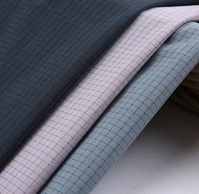 100D Woven Plain Four Way Elastic Mesh Hole Quick Drying Waterproof Polyester Spandex Sportswear Fabric for Boys