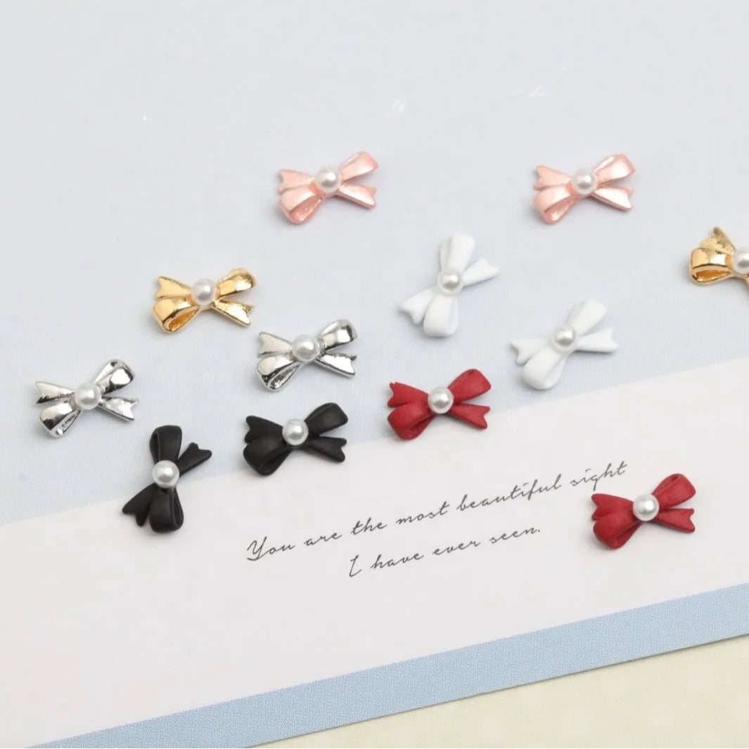 Wholesale New 3D Three-Dimensional Metal Pearl Bow Tie Jewelry Magic Bow Nail DIY Decoration Nail Rhinestones Genre