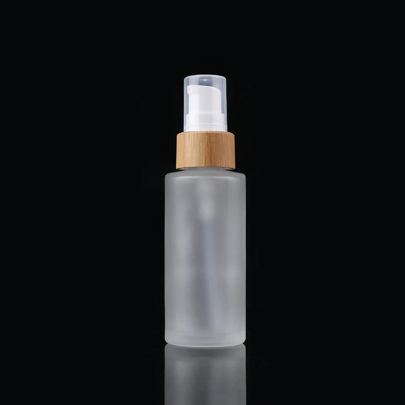 Cosmetic Container with Bamboo Pump 100ml/3.4oz Refillable Translucent Frosted Glass Travel Lotion Pump Bottle Lotion Dispens
