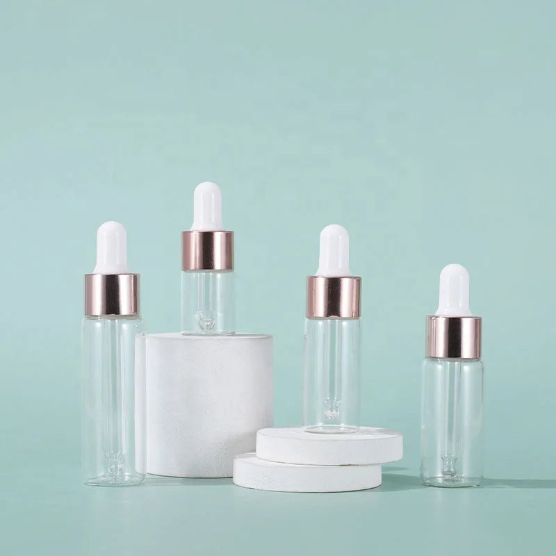 Wholesale clear 5ml 10ml clear Small Glass Dropper Bottle 15ml 20ml Serum Glass Oil Bottle with Rose Gold Ring in Stock