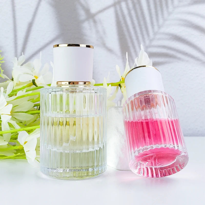 Hot Sell 30ml 50ML Cylindrical Flat Clear Vertical Pattern Glass Perfume Bottle With Spray Cap