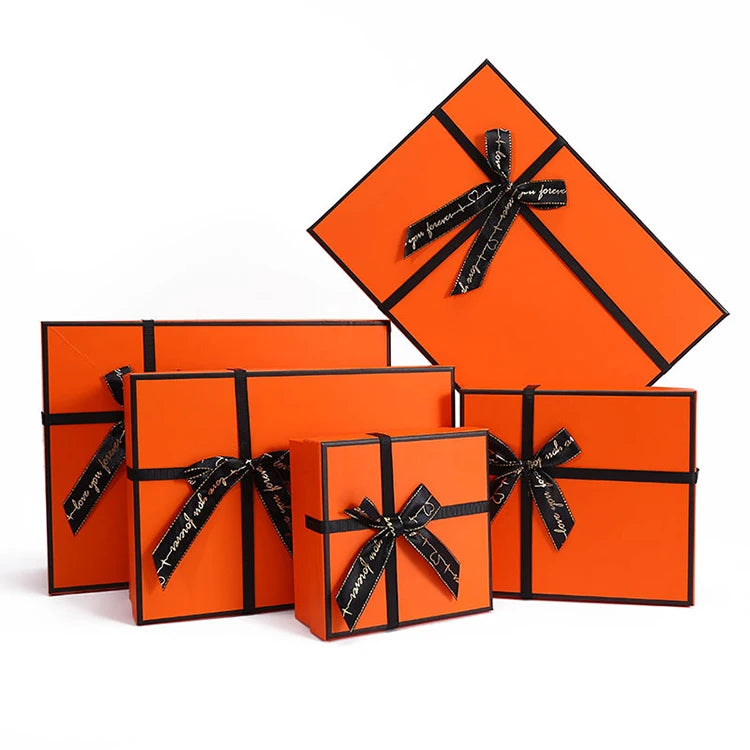 New Creative Orange Bow Gift Box for Lipstick Cosmetics Christmas Gift Box with Gold Foil Stamping Embossing Vanishing Printi