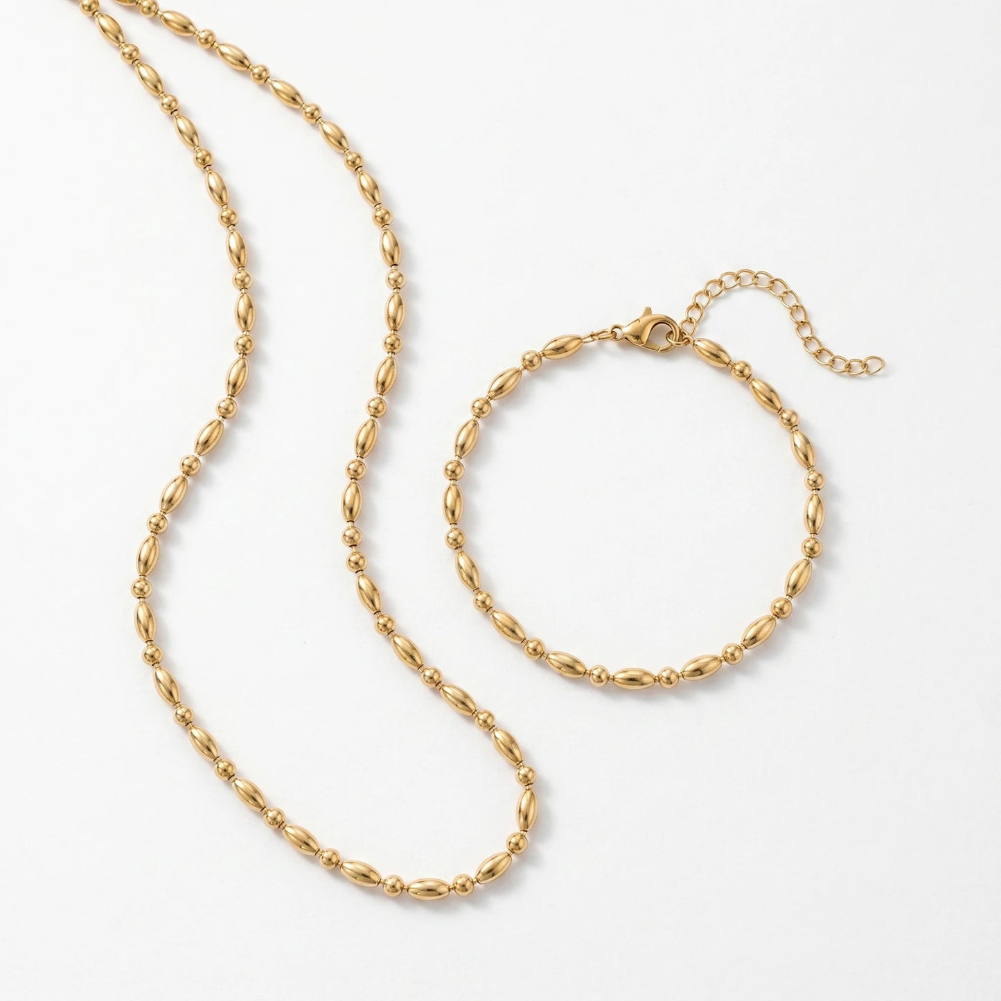 QIAOREN 11632 Waterproof 18K Gold Plated Stainless Steel Rice Bead Jewelry Set Necklace Bracelet Daily Wear