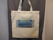 Bolso de Mano de Lona con Diseño de Muelle de Pesca de Venecia por un lado y Rayos de Sol por otro lado