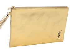 Bolsa plana Yves Saint Laurent Beauty dorada con borla