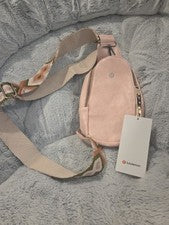 Bandolera Lululemon rosa claro