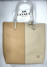 Bolso de Mano COACH Nomad en Bloques de Color Marfil Norte - CN423 NUEVO