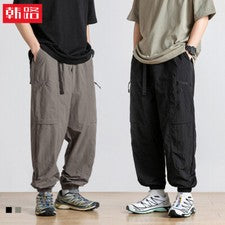 Pantalones de moda informales plisados de color liso para hombre pierna para herramientas