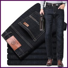Nuevos pantalones de mezclilla suaves 2023 para hombre calce elástico negocios moda