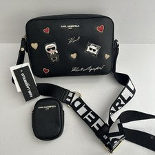 Bandolera para mujer Karl Lagerfeld negra Maybelle Cat con alfileres nueva con etiquetas $198