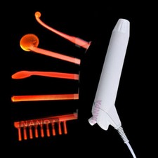 Máquina facial de alta frecuencia para el cuidado de la piel con 5 electrodos de vidrio violeta naranja
