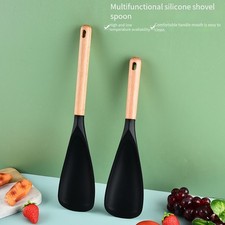 Cuchara de silicona reforzada de acero inoxidable para sartenes antiadherentes 600F tolerancia al calor