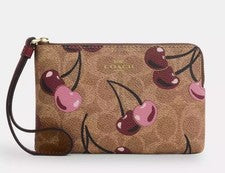 Muñequera Coach CZ450 con cremallera en esquina con estampado de cereza de lona y cuero de firma nueva con etiquetas