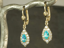Pendientes de oro 585 con topacio azul cielo 28 mm largo 1 par con peinado