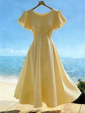 Elegante maxivestido de mujer con cuello redondo y dobladillo con volantes