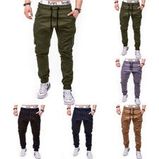Para hombres Informal Moda Color Sólido Bolsillo Lateral Atado Elástico Leggings Pantalones