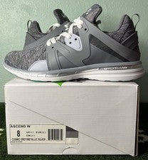 US Mujer 8 - APL Ascend "Gris Cósmico/Plata Metálico" Nuevo en Caja, Zapato para Correr