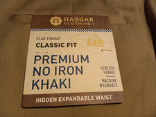 Pantalones para hombre Haggar caqui calce clásico cintura expandible oculta 34W 29" en beige