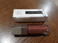 FENTY BEAUTY BRILLO BOMBA TAMAÑO COMPLETO "HOT CHOCOLIT" ¡LUMINIZADOR DE LABIOS UNIVERSAL!