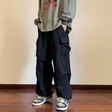 Pantalones informales para hombre cintura elástica color liso pantalones cargo varios bolsillos pantalones sueltos