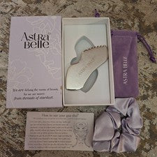 Masajeador facial Astra Belle Gua Sha de acero inoxidable para el cuidado de la piel facial herramienta de raspado
