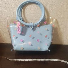 Bolso de mano de plástico azul y transparente con diseño de labios rosa y naranja