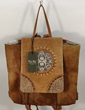 Bolso de mano/mochila artesanal Myra Bag para mujer de lona nominal de cuero de vaca.