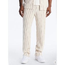 Pantalones de moda Nova ajustados Caicos con abertura texturizada