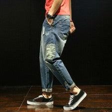 Pantalones de mezclilla estilo harén para hombre Pantalones holgados Parche informal suelto retro