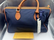Bolso clásico para mujer Dooney & Bourke azul marino logotipo acento herrajes dorados