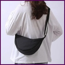 Bolso de hombro portátil de color liso para mujer simple acolchado de tela de nailon para mujer