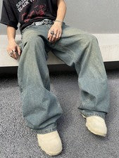 Pantalones de mezclilla sueltos de pierna ancha desgastados de moda para hombre, sin cinturón de cadena