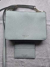 Bandolera y tarjetero Kate Spade azul menta