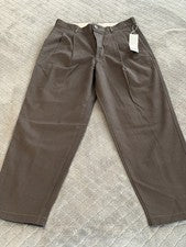 Pantalones cónicos plisados calce ancho UNIQLO U de algodón talla 30 estilo 420664 nuevos con etiquetas