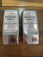 Lote de 2 Gotas Bronceadoras Revolution Beauty, Bronceado y Especias Brillantes
