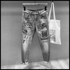 Pantalones de mezclilla para hombre bordados gráficos informales estilo coreano graffiti estampado de letras