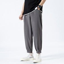 Pantalones deportivos sueltos informales lisos de moda de seda helada delgada de verano para hombre